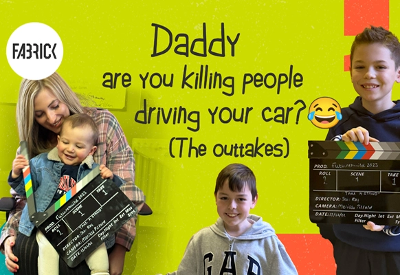 Fabrick children holding filming props