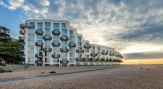 Beachfront exterior shot of Shoreline, Folkestone development delivered by contractor, Jenner
